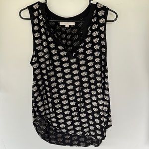 Black tank top with floral detail. Very soft material